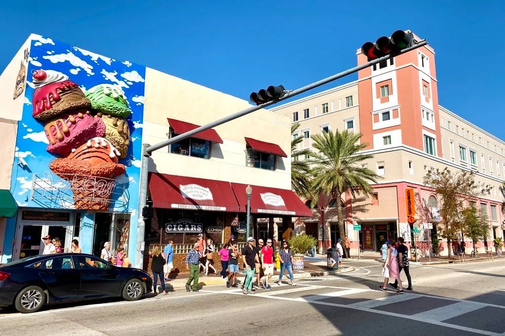 A picture of the exterior of a restaurant on the street.