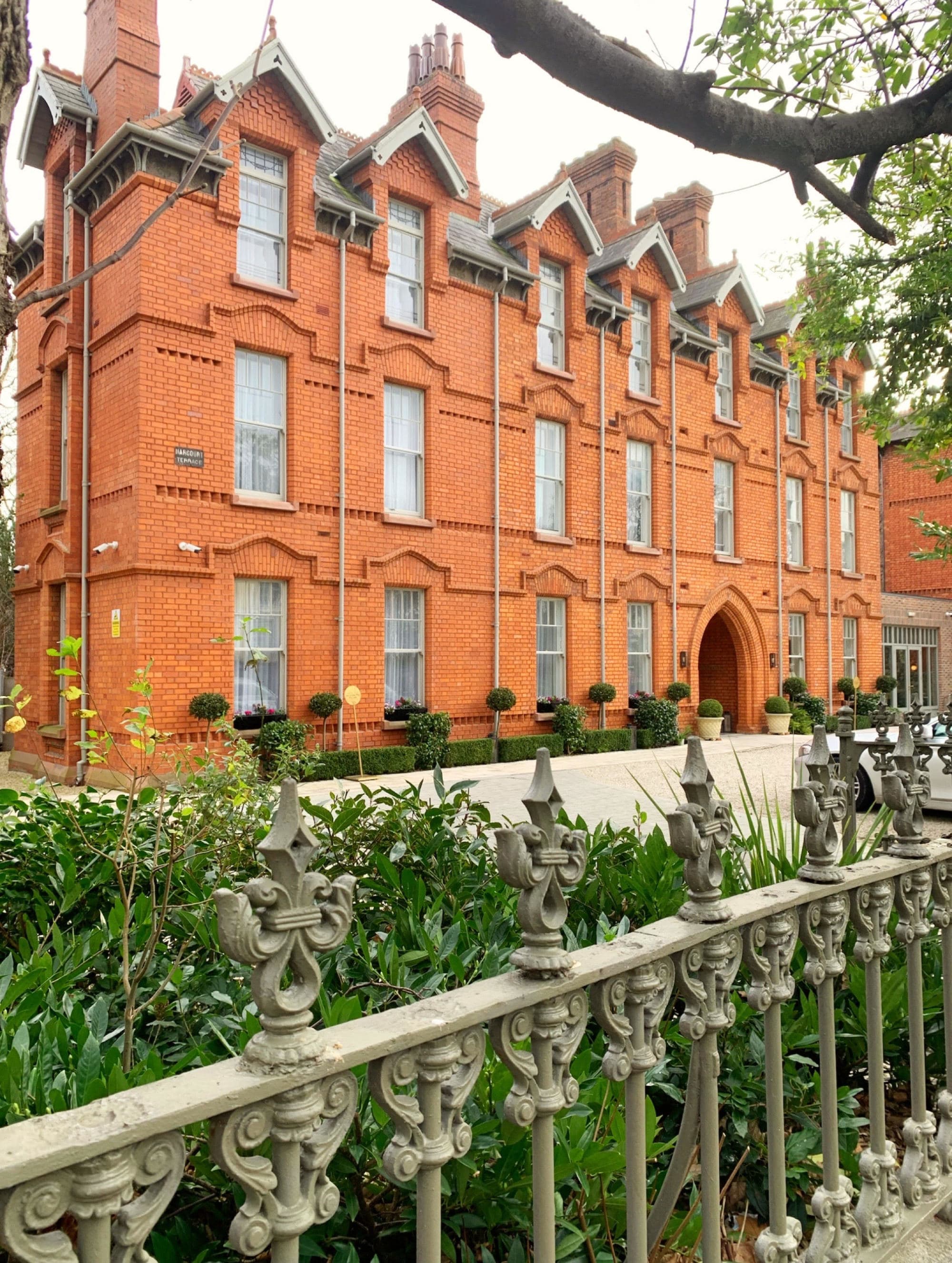 The front of a red brick building 