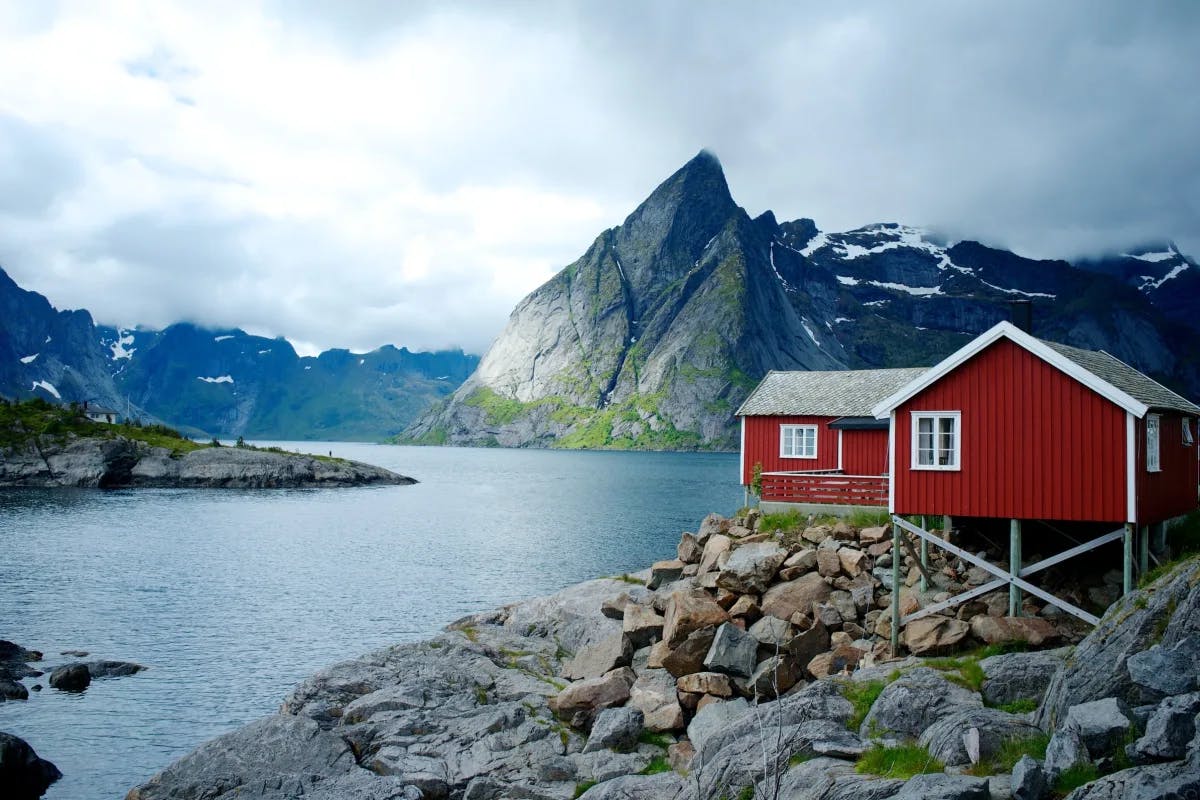 A red and white wooden house at Eliassen Rorbuer.