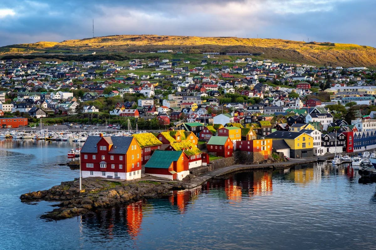 Aerial view of a colorful, seaside village during the daytime