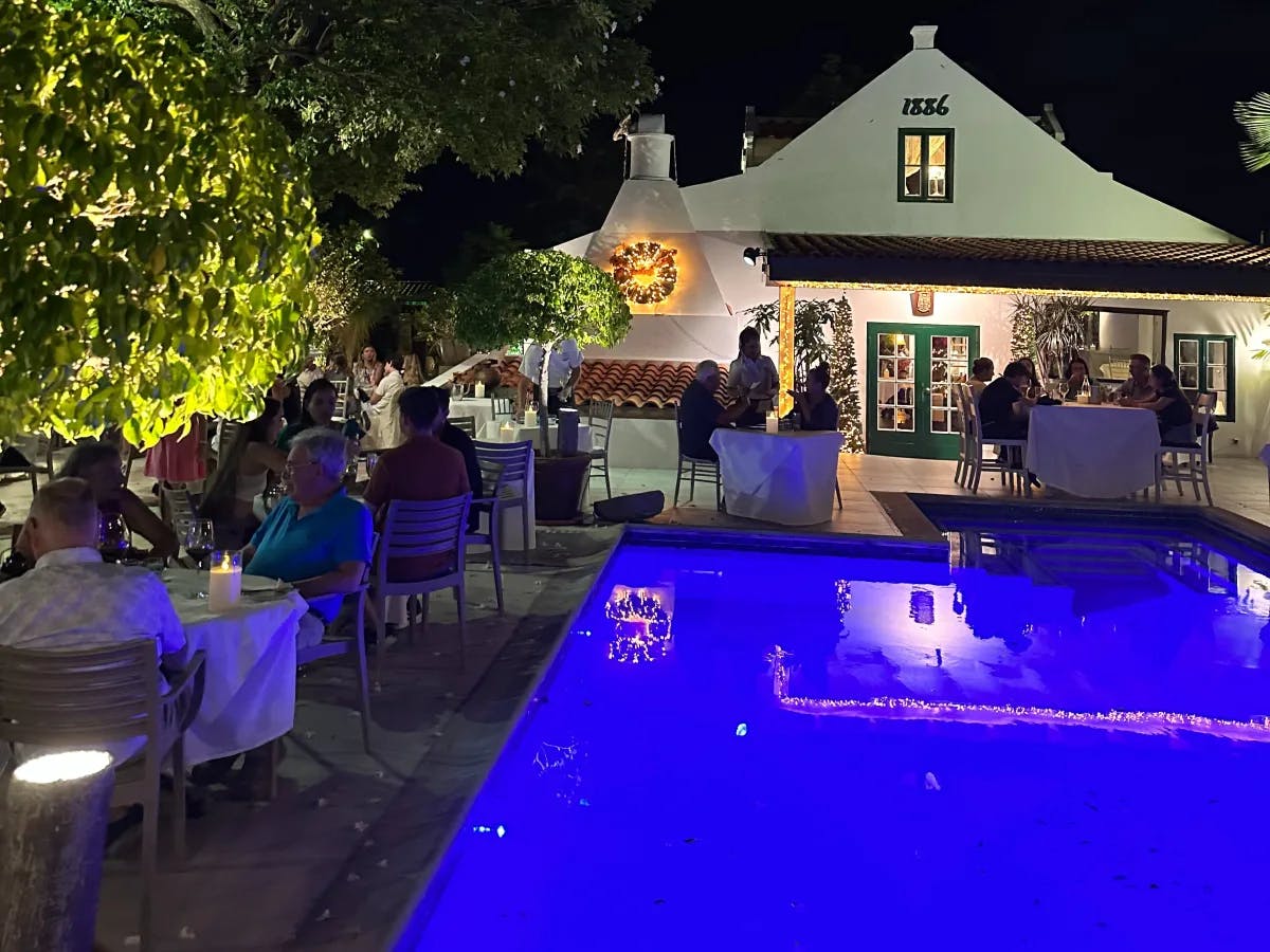 people sitting and eating in a restaurant