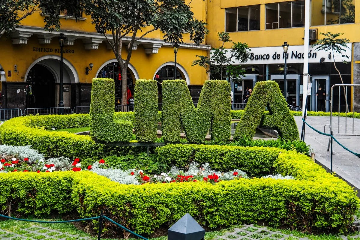 Lima signage in a garden. 