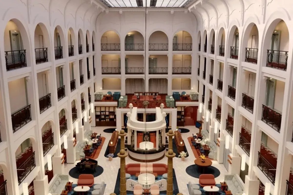 four-story lobby atrium with modern seating areas