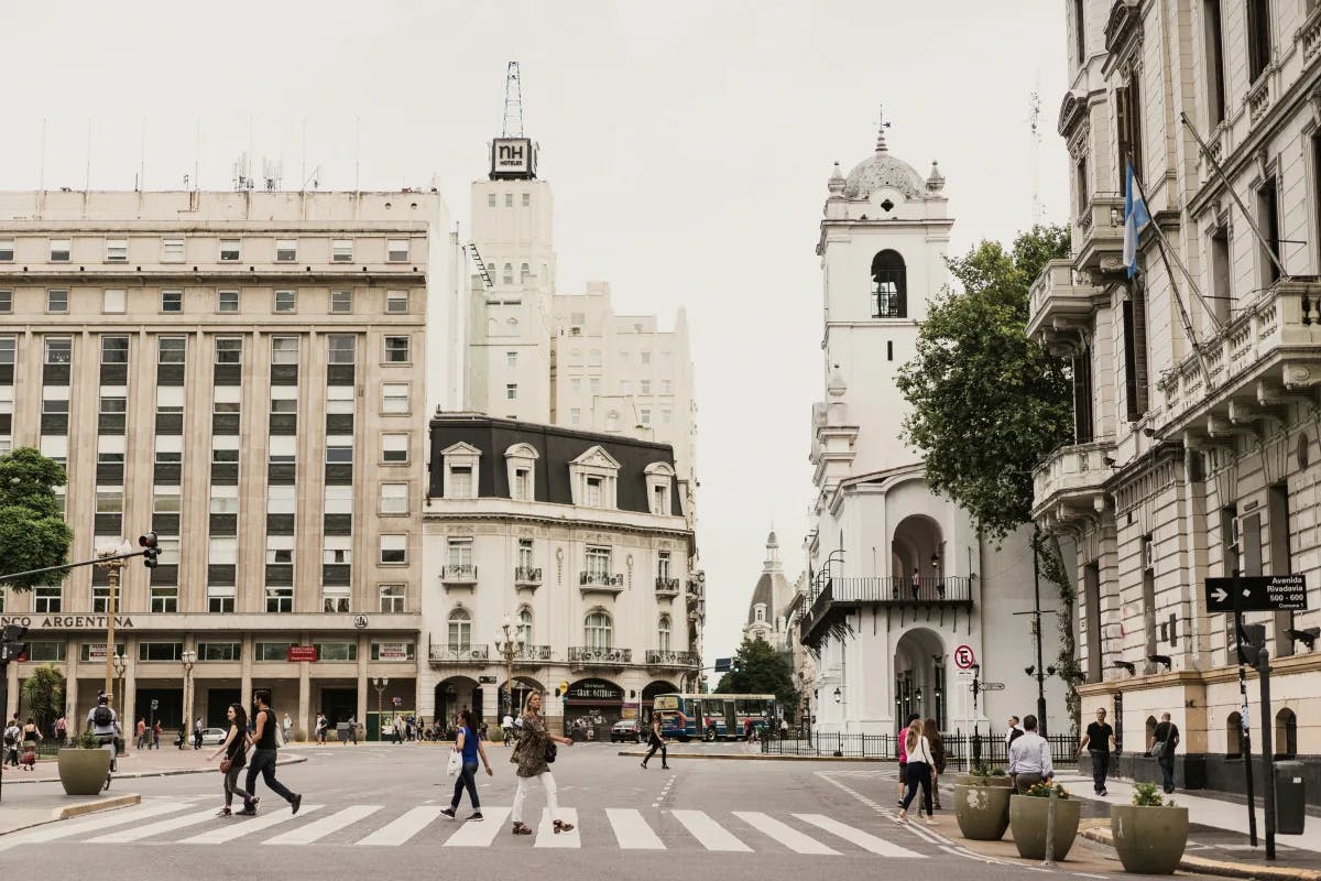 People walking around a city street during the daytime