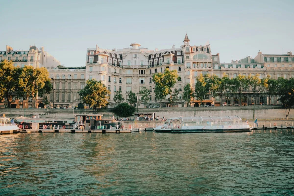 A view of the river with buildings behind it