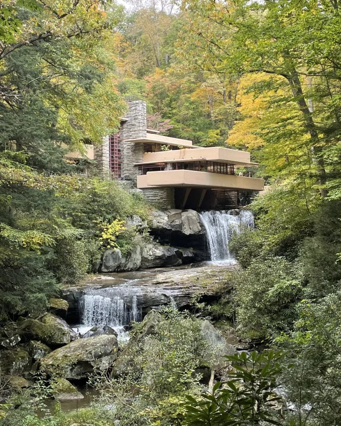 A house built over a multi-level water fall