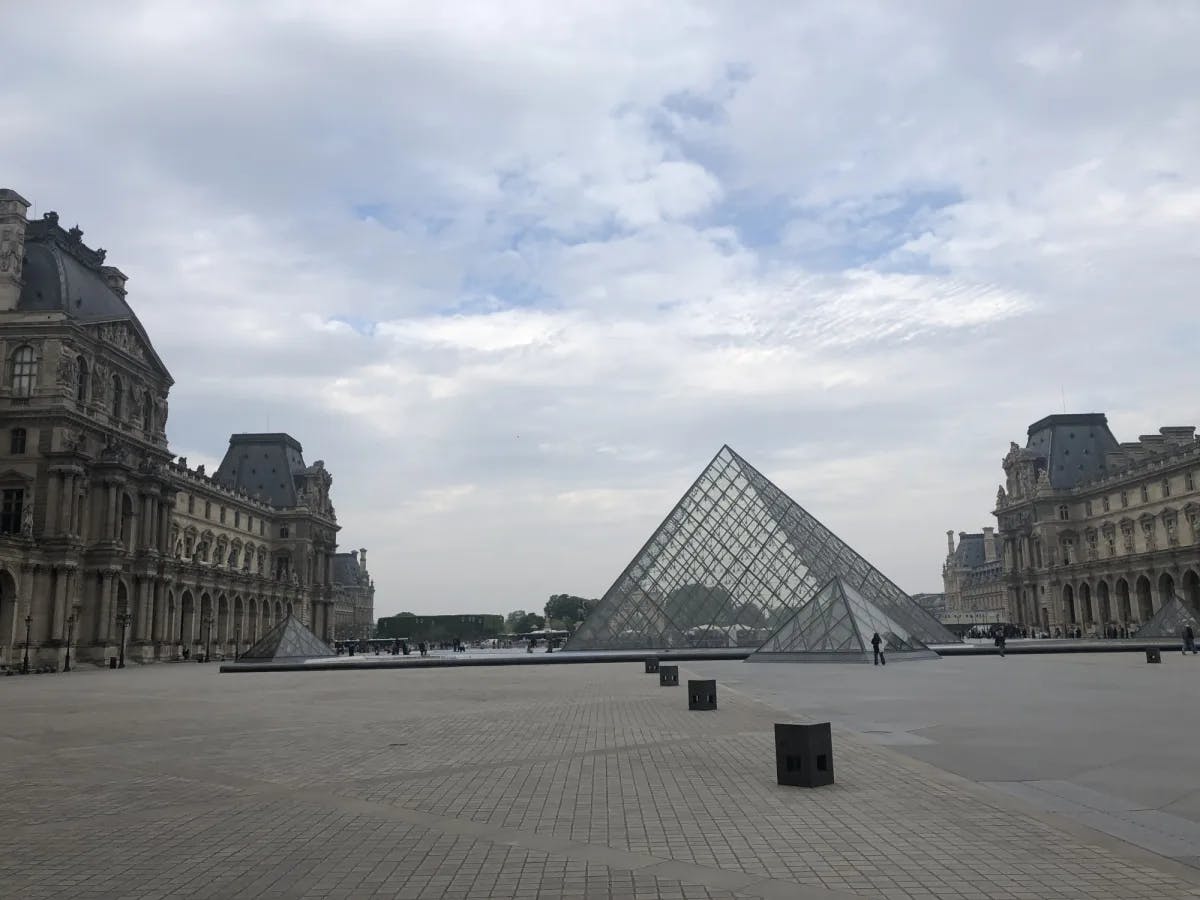 A triangular landmark in between the buildings.