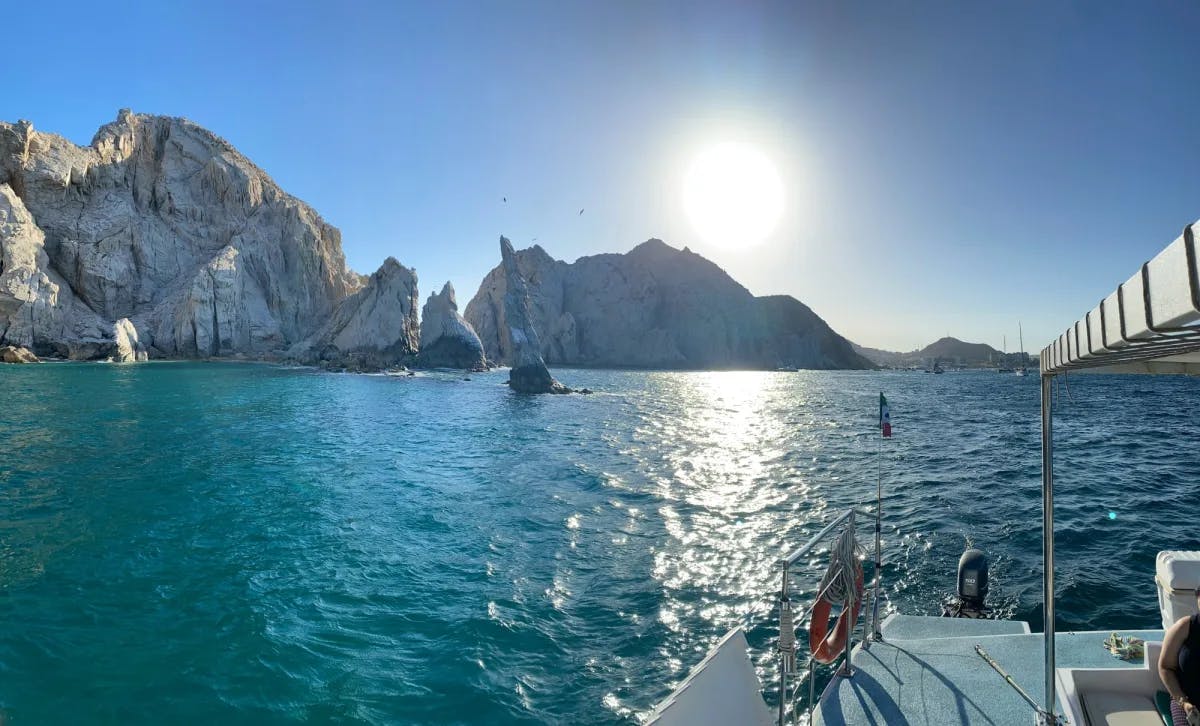 View of cliffs in the water from a boat in the sea 