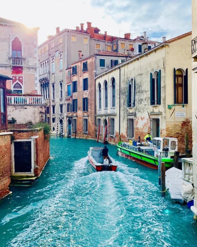 A boat sailing in the water canal