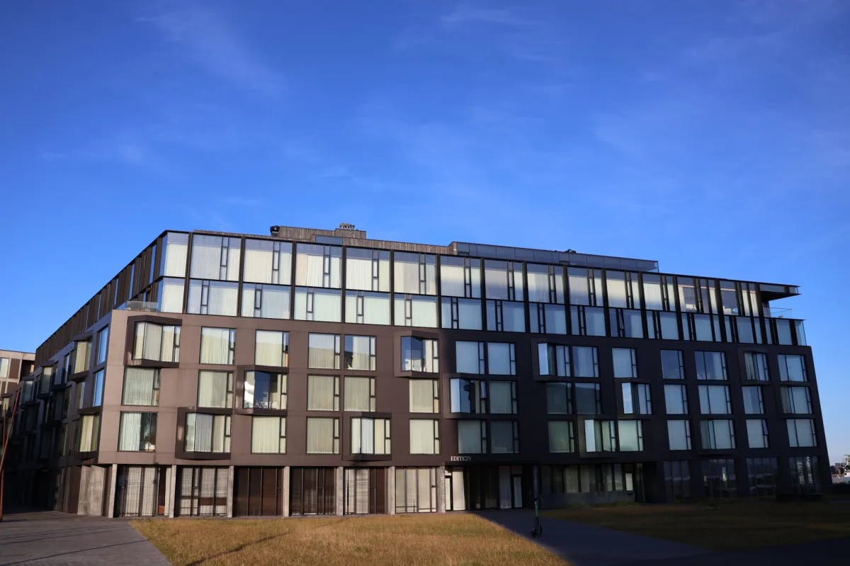 The exterior of a hotel building during the daytime