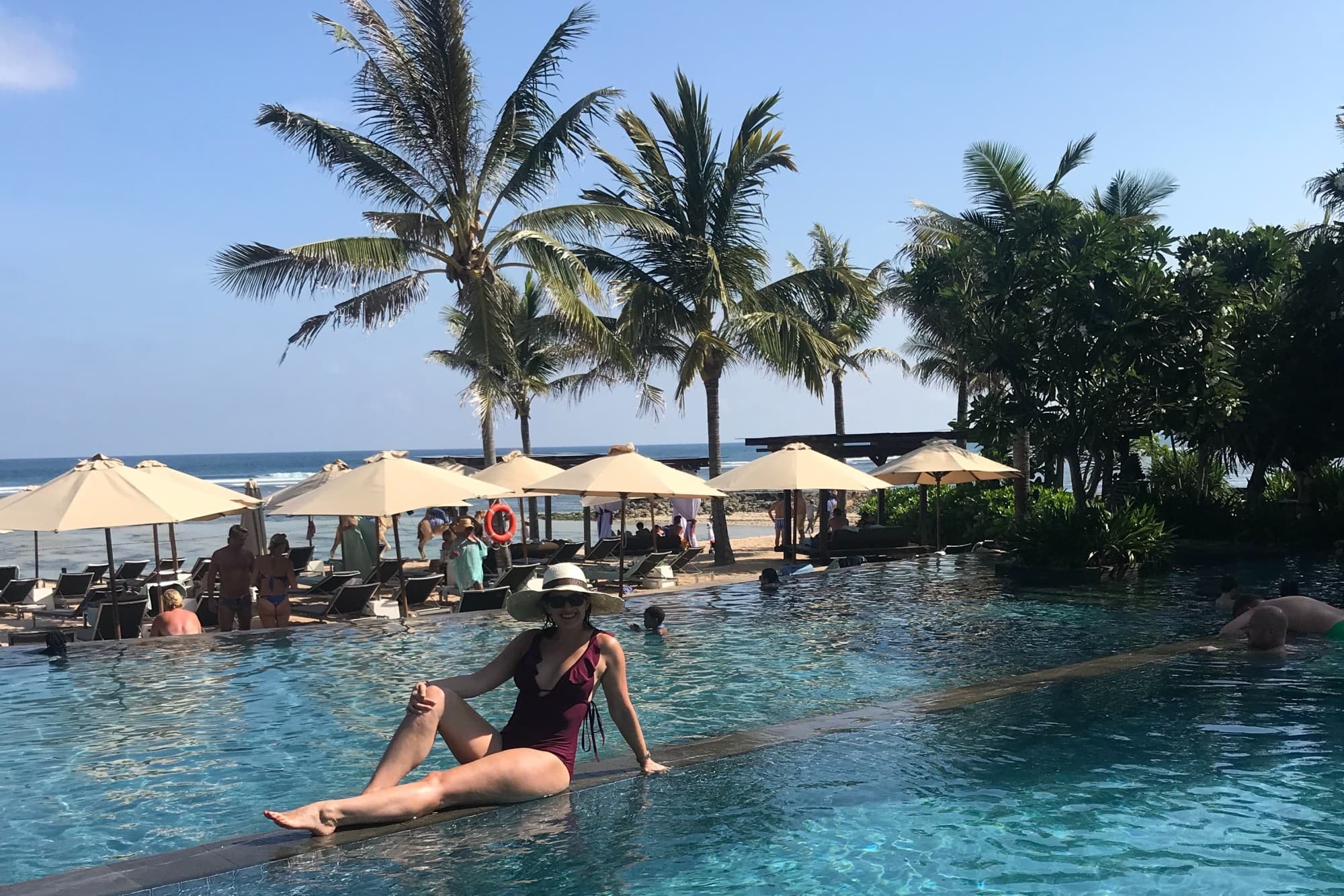 Emily laying on the pool