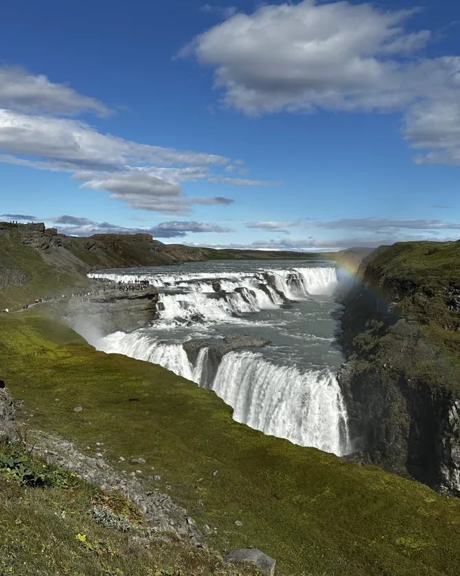 Beautiful view of a massive waterfall on a sunny day