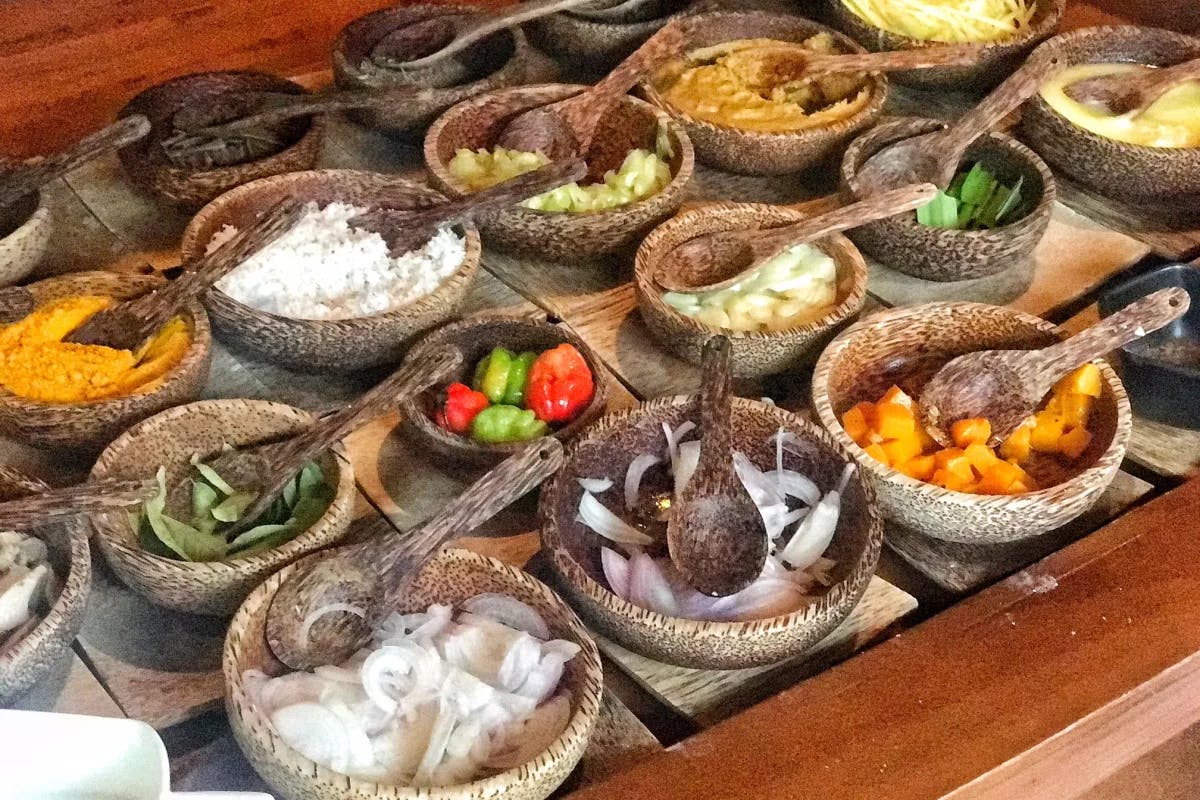 Maldivian cuisine centers around fresh seafood, coconut and aromatic spices.