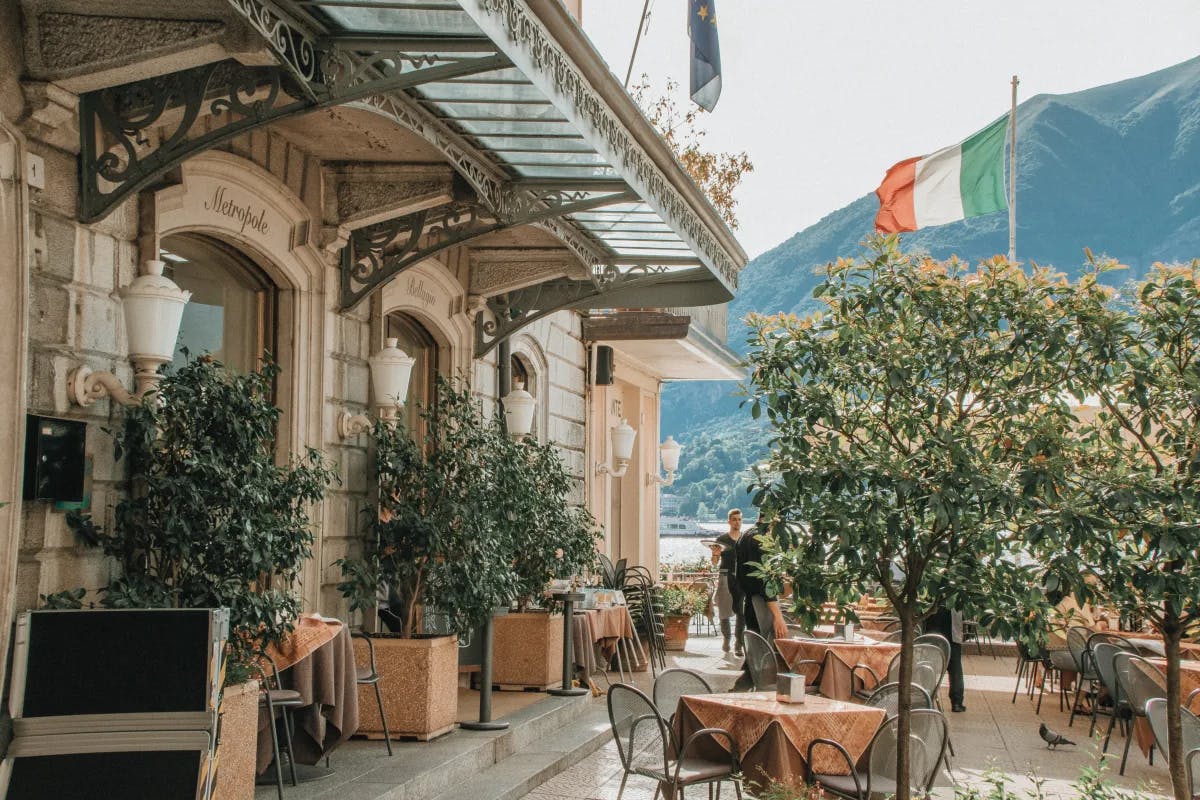 A picture of a restaurant taken from outside during the daytime