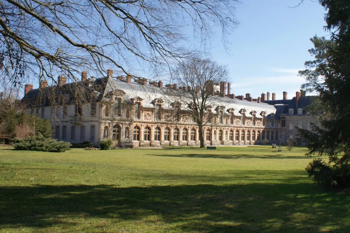 A white and brown themed building at Château de Fontainebleau.