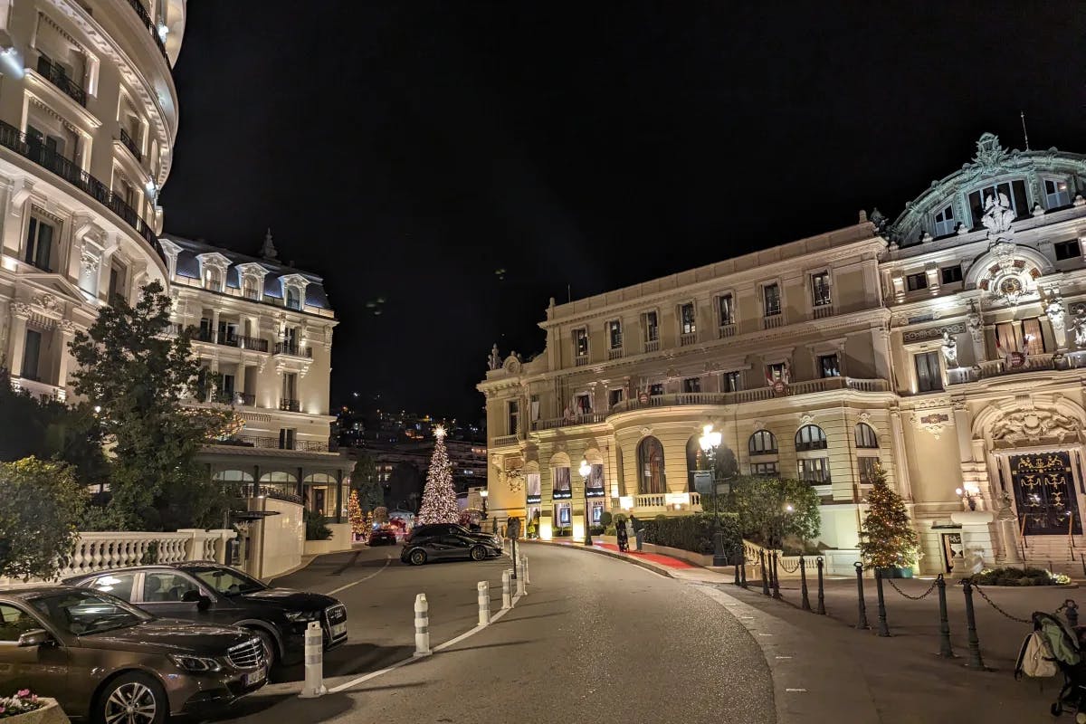 A picture taken outside the Monte Carlo Casino during nighttime.