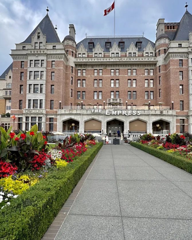 A building saying Empress with garden in the front. 