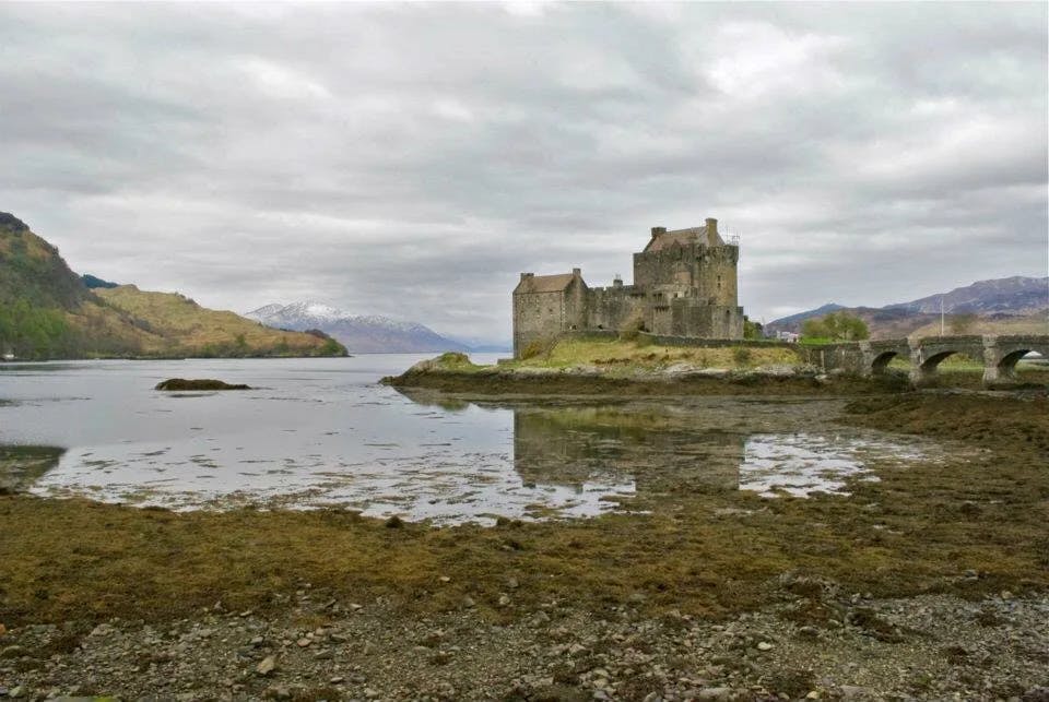 Eilean Donan Castle stands proudly on a small island at the confluence of three lochs.