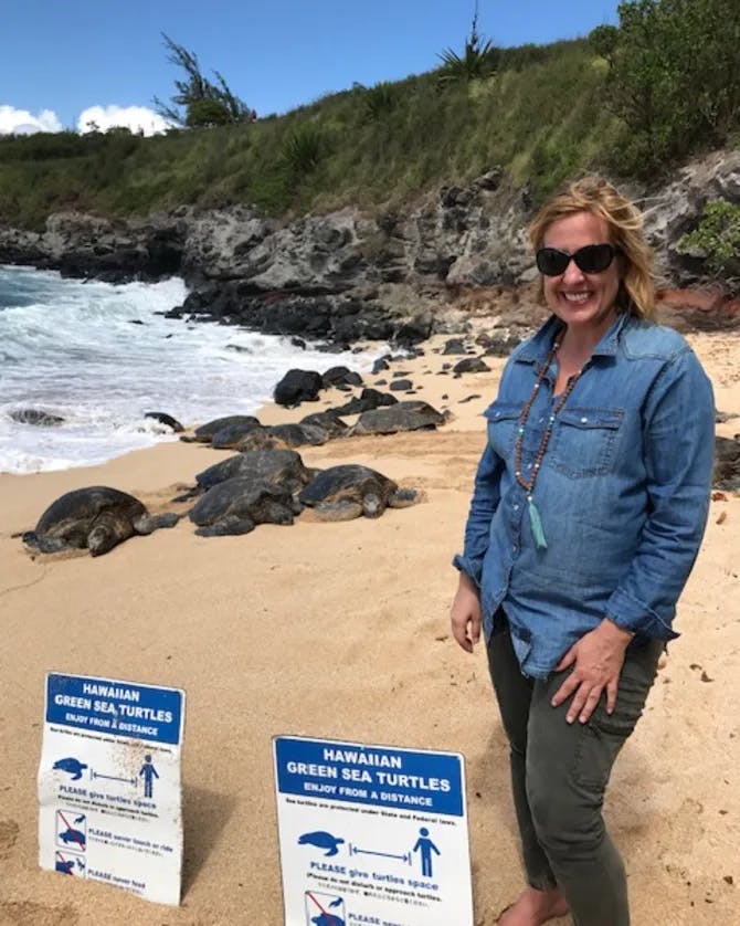 Posing for a picture with Sea turtles