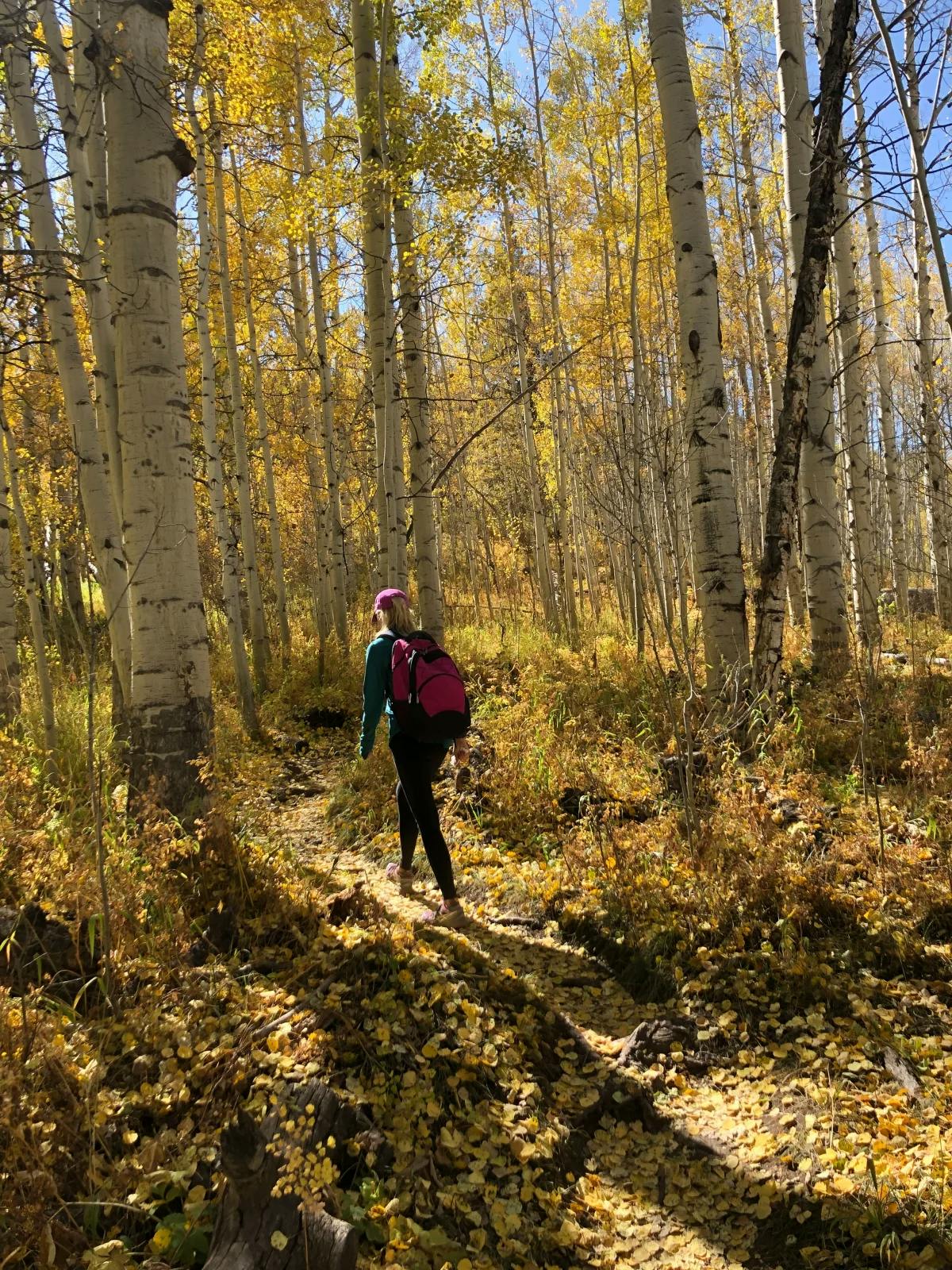 woman-walking-vail-travel-guide