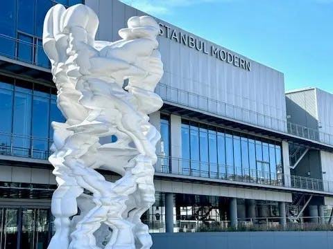 Statues in Istanbul and a building at the back