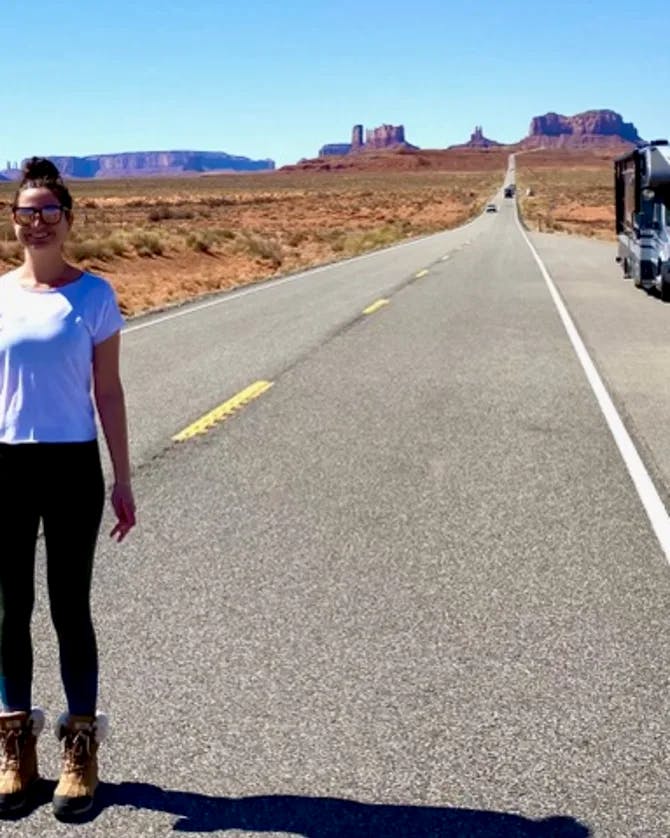 Posing for a picture on a road