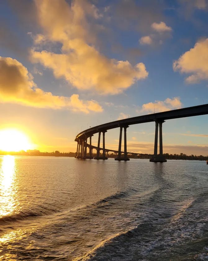 A sunset view with a bridge. 