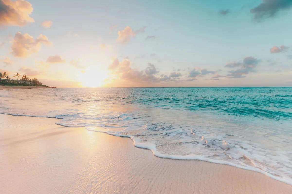 Beach with white sand during the sunrise