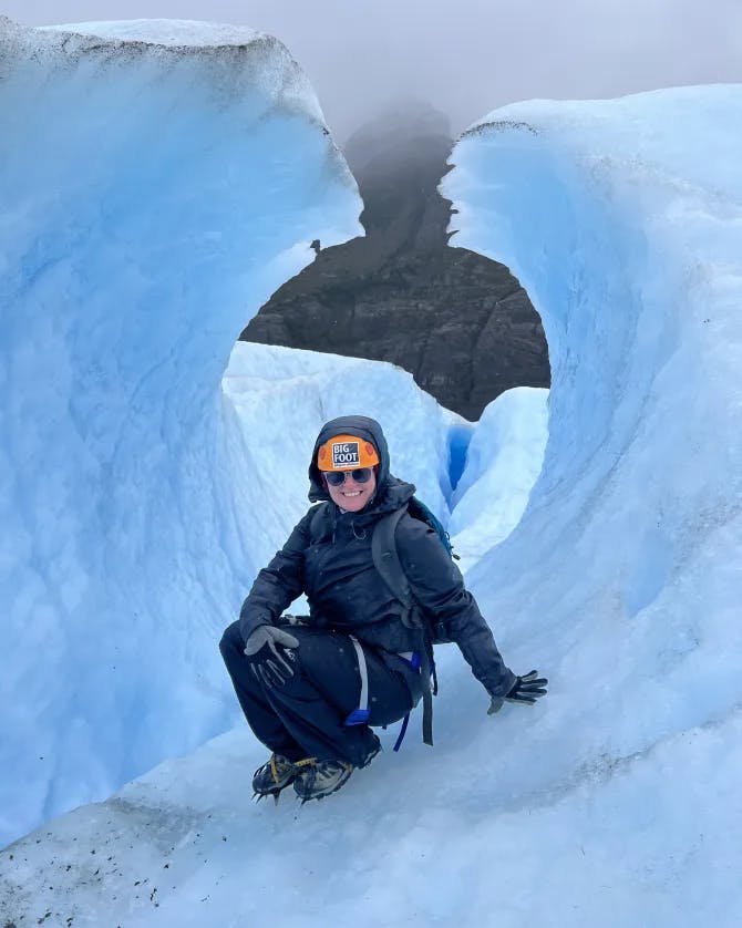 Travel advisor posing in a snowy region