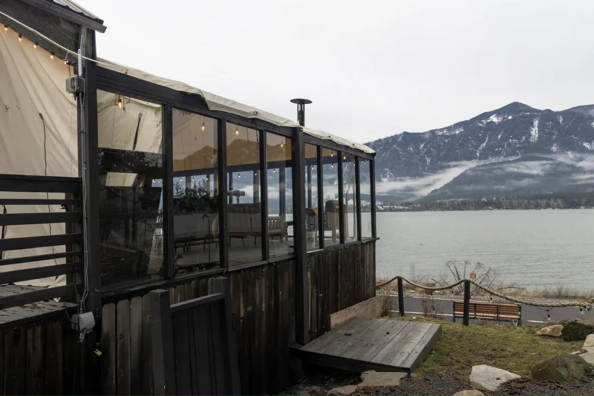 A building outside in front of a river