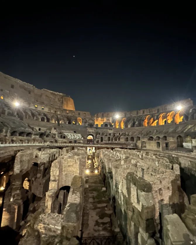 Picture of the Colosseum ruins at night