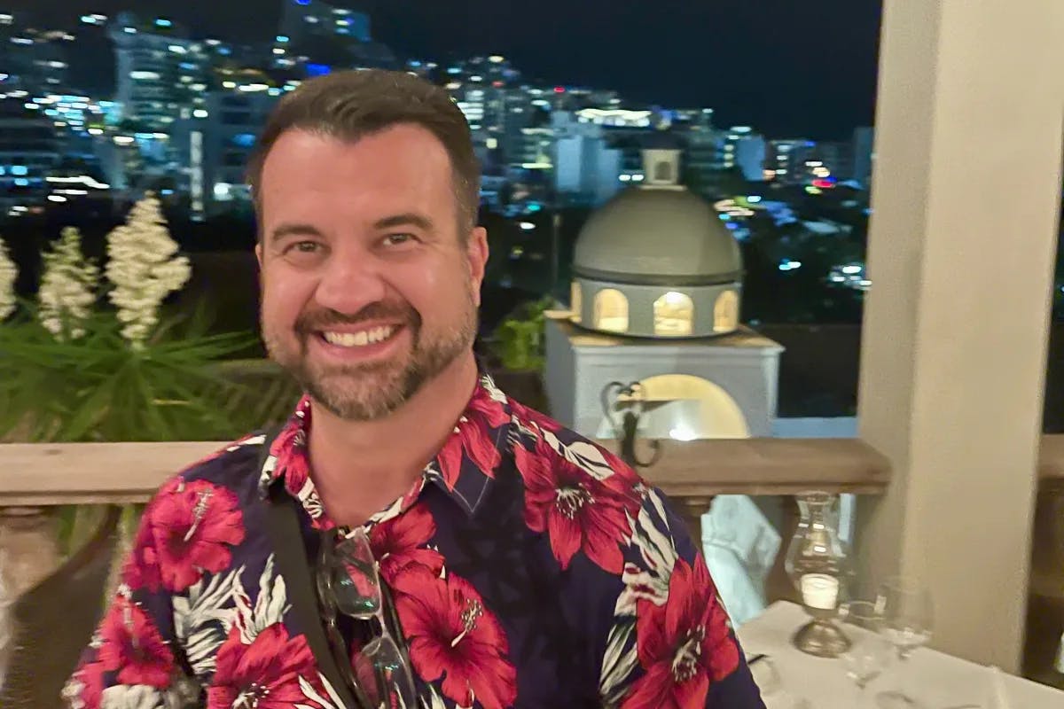 Travel advisor Eric at an elegant restaurant overlooking the city of Puerto Vallarta.