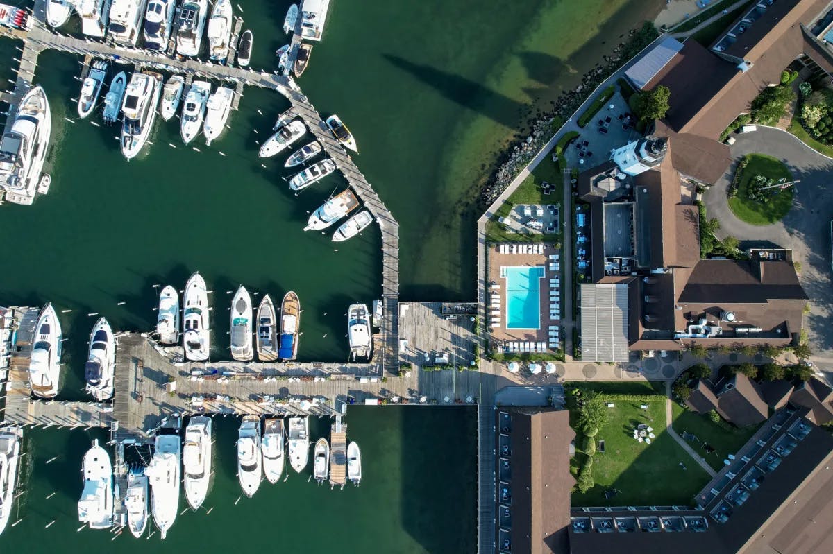 aerial view of a marina filled with yachts