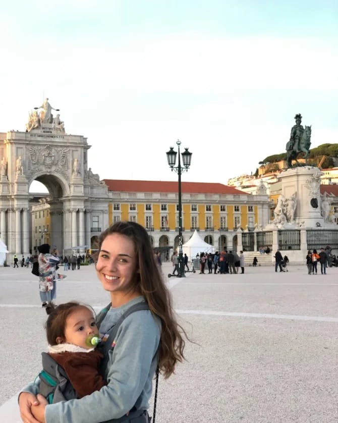 Travel advisor posing with a baby