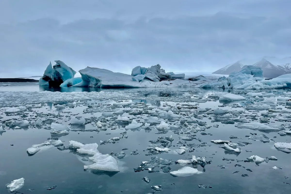 Fjallsárlón Glacier Lagoon features floating icebergs and panoramic views of the Vatnajökull glacier.