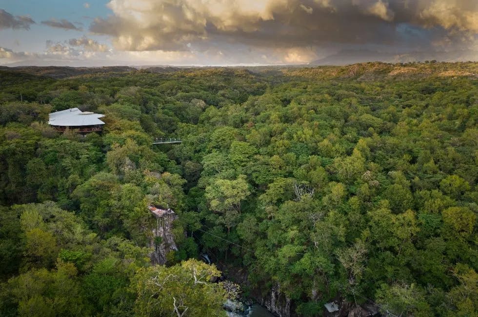 aerial view of a lodge amidst thick Costa Rican jungle