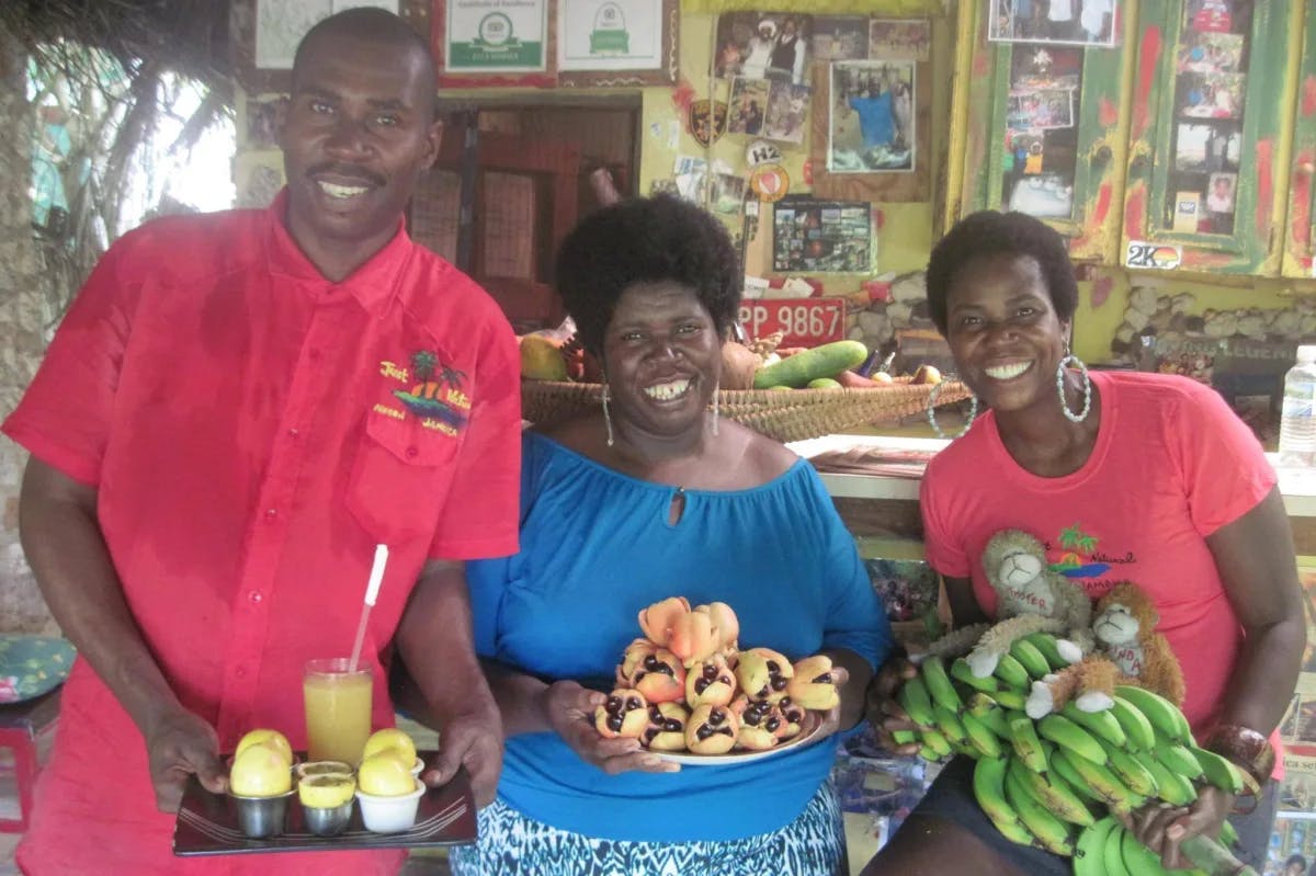 A group of people holding local food