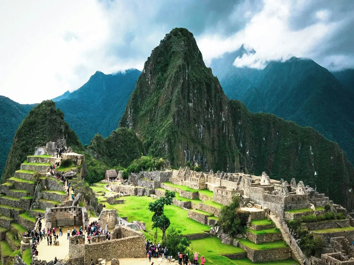 A glimpse into the ancient Incan world: Machu Picchu stands timeless with Huayna Picchu towering in the background.