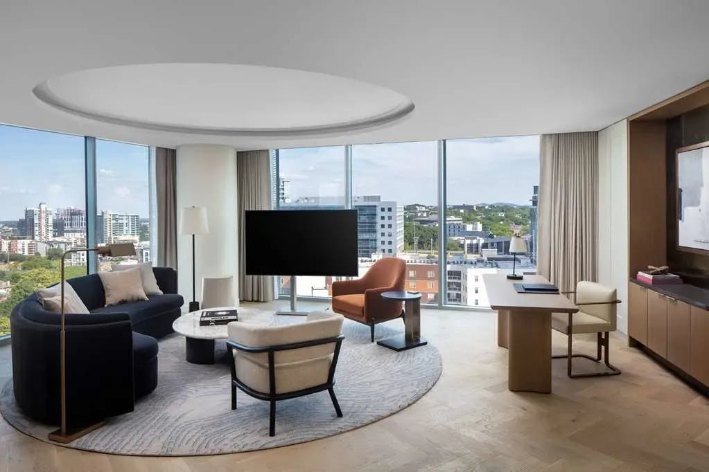 A unique circular setup for a living space at Conrad Nashville with views of the city