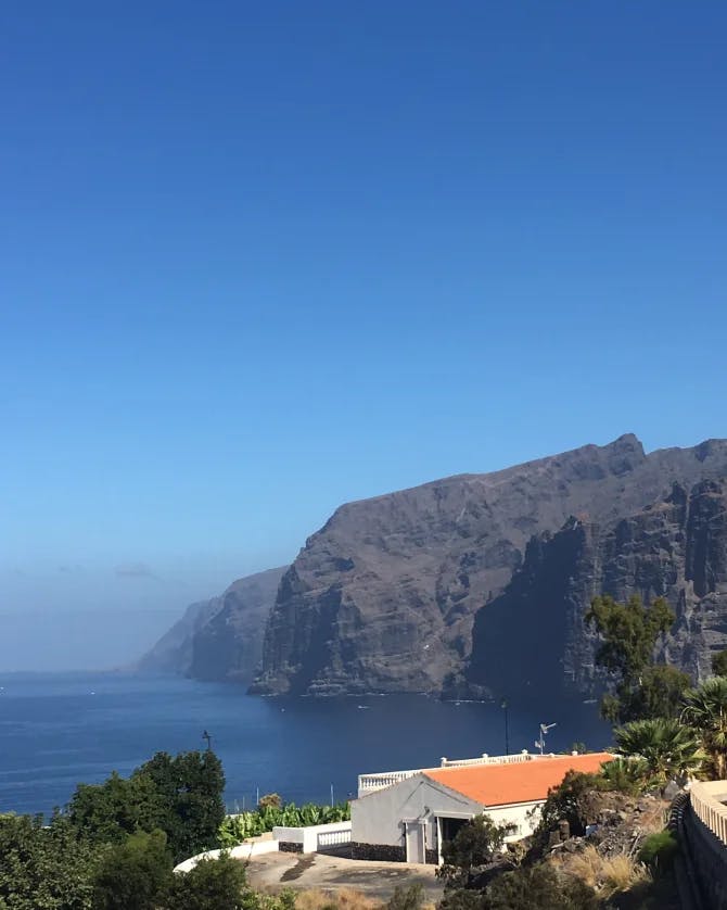 Beautiful view of the cliffs and ocean in Los Gigantes town in Tenerife