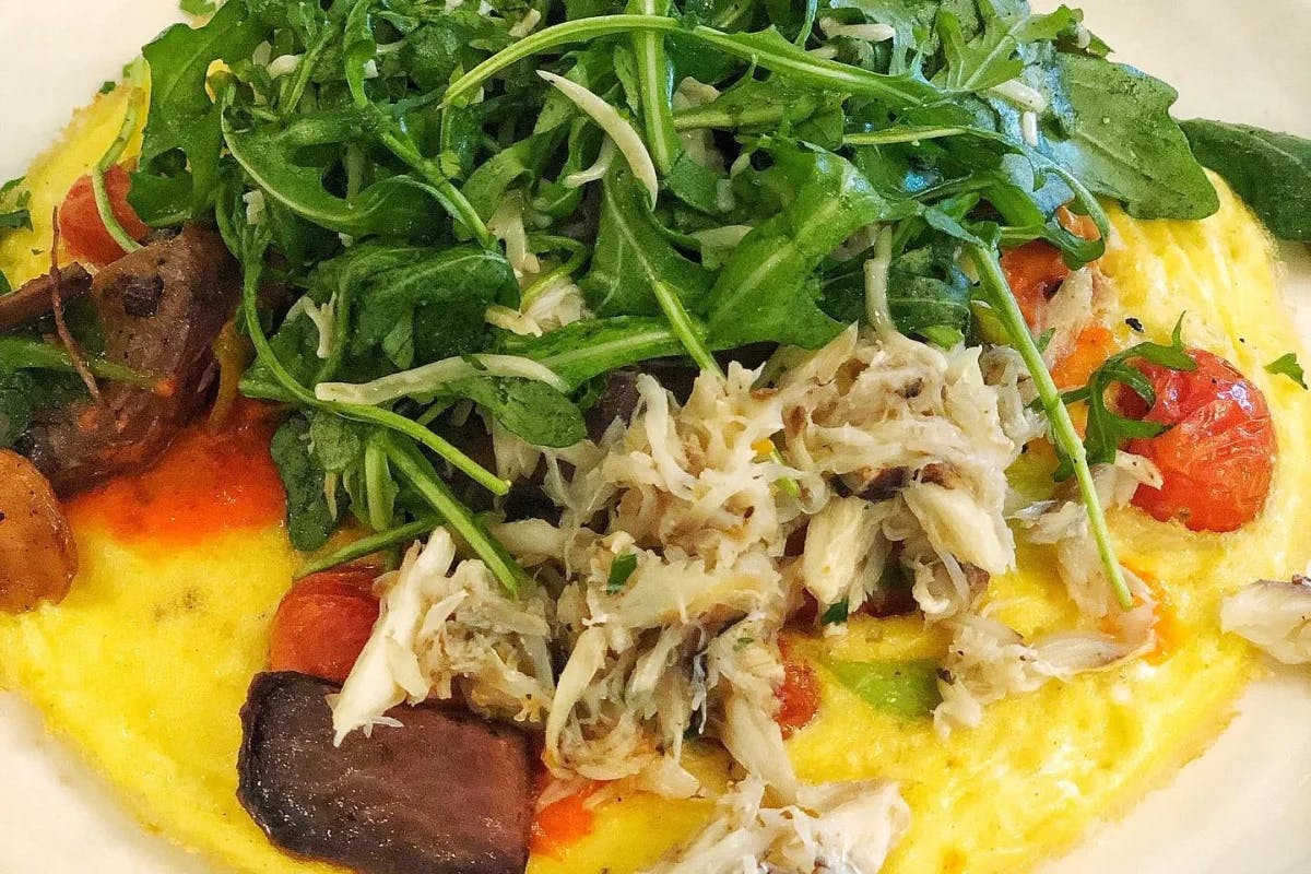 Have a delicious Vegetable Frittata with Lump Crab Meat for Brunch at Commander's Palace.