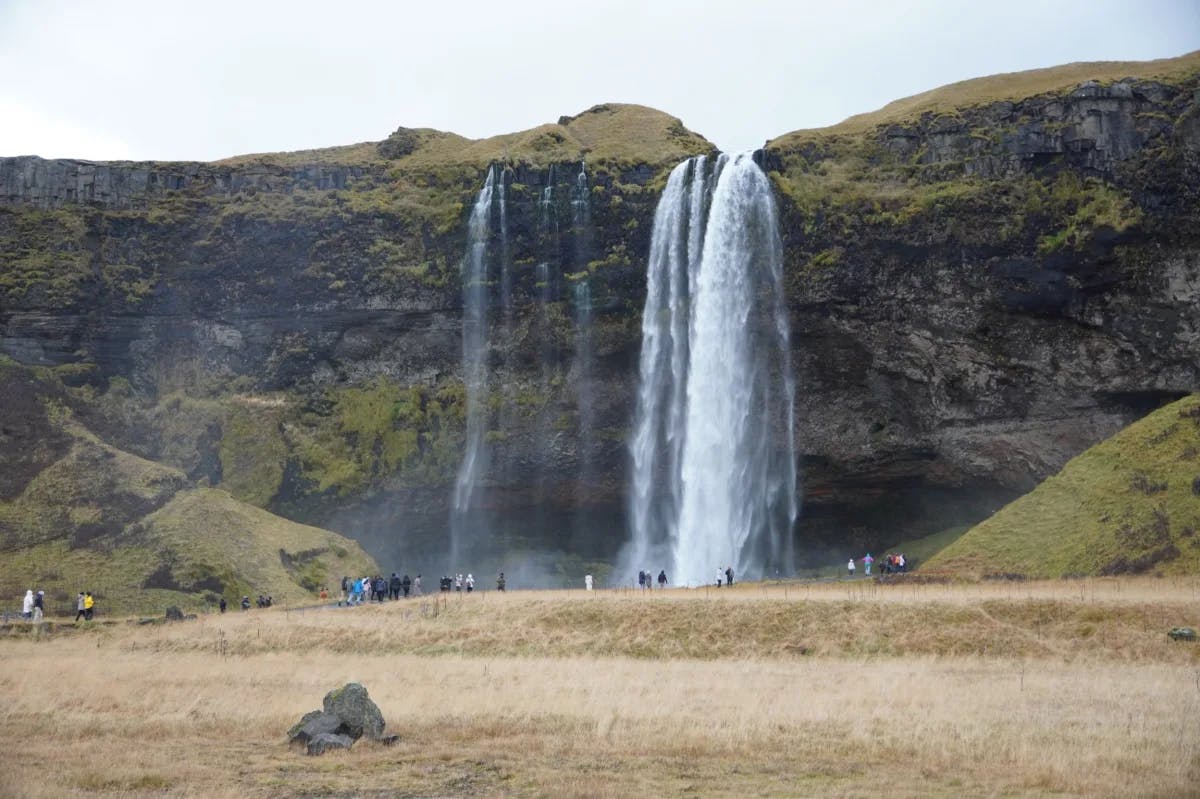 A far view picture of a waterfall in the daytime.