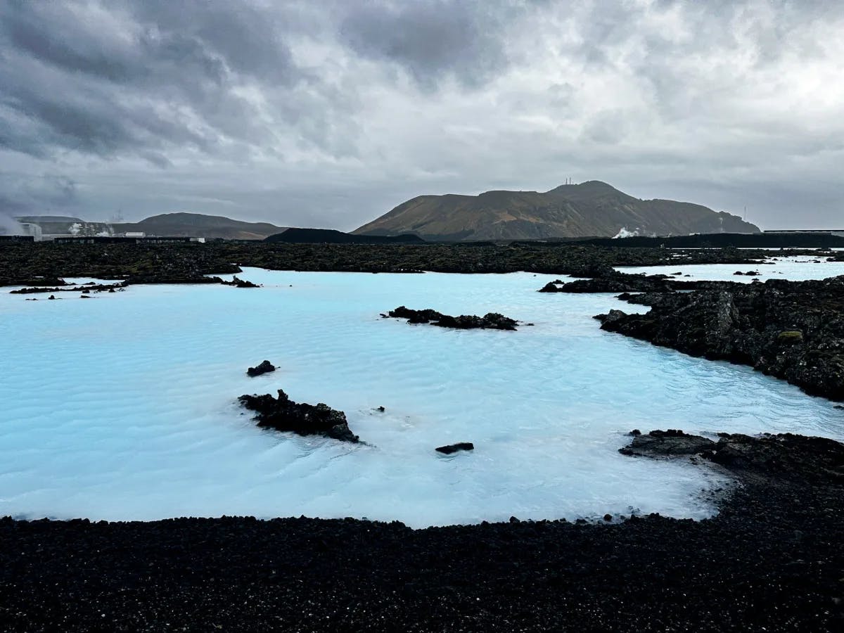 The blue lagoon, a large icy-blue pool amongst rock formations.