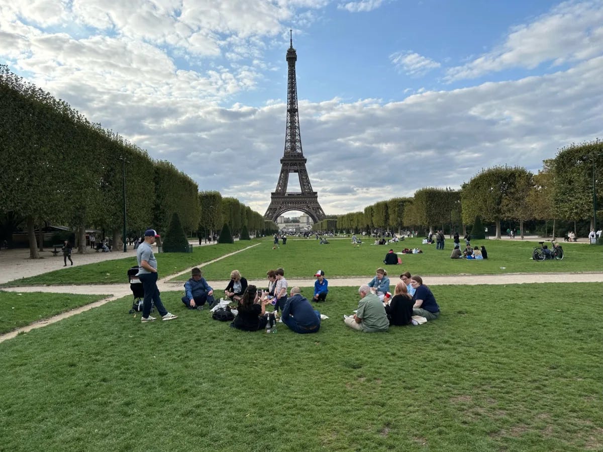 Picnic in front of Eiffel Tower. 