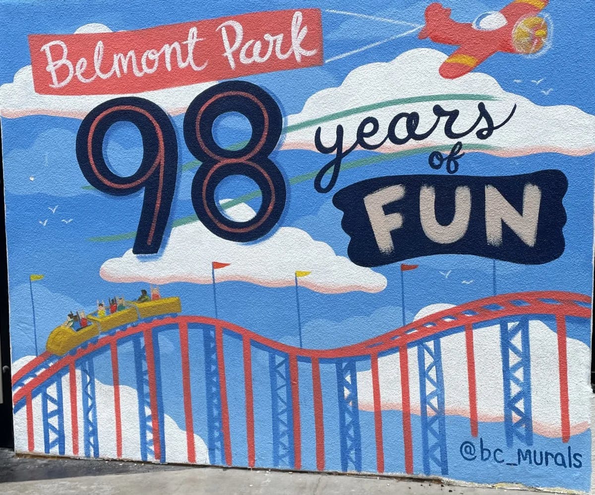 A wall painting saying Belmont Park 98 years of fun. 