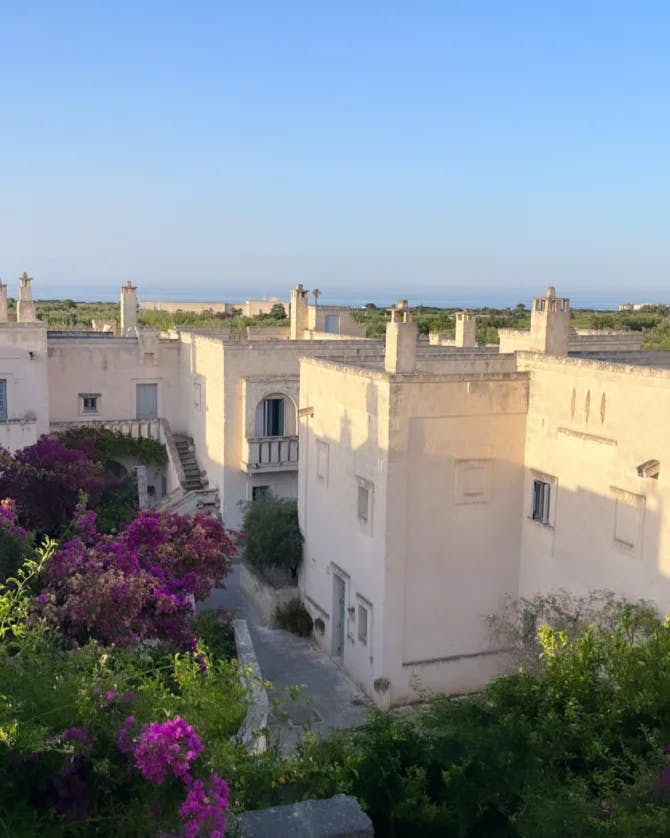 Beautiful view of the white buildings of Borgo Egnazia hotel on a sunny day