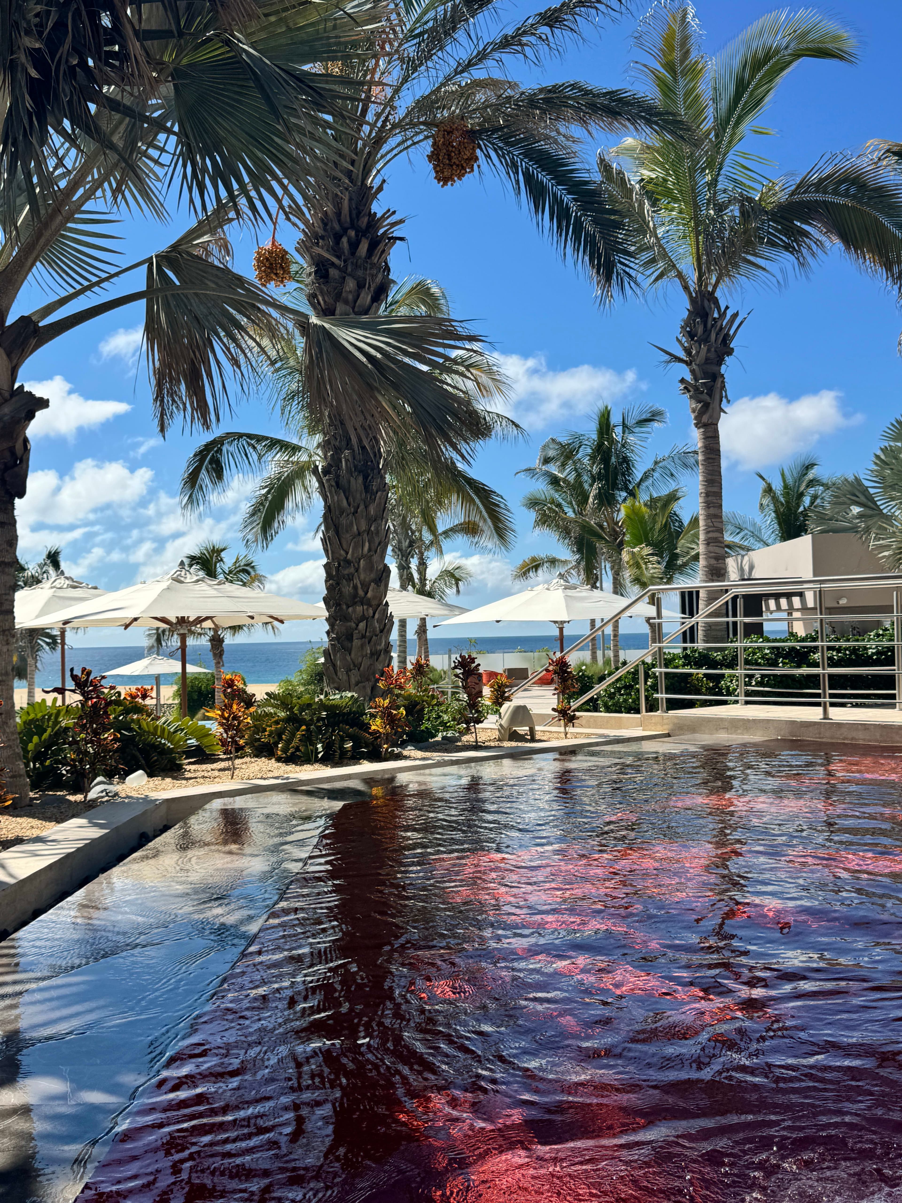 Relax at the pool with a view of the beach at Hard Rock Los Cabos.