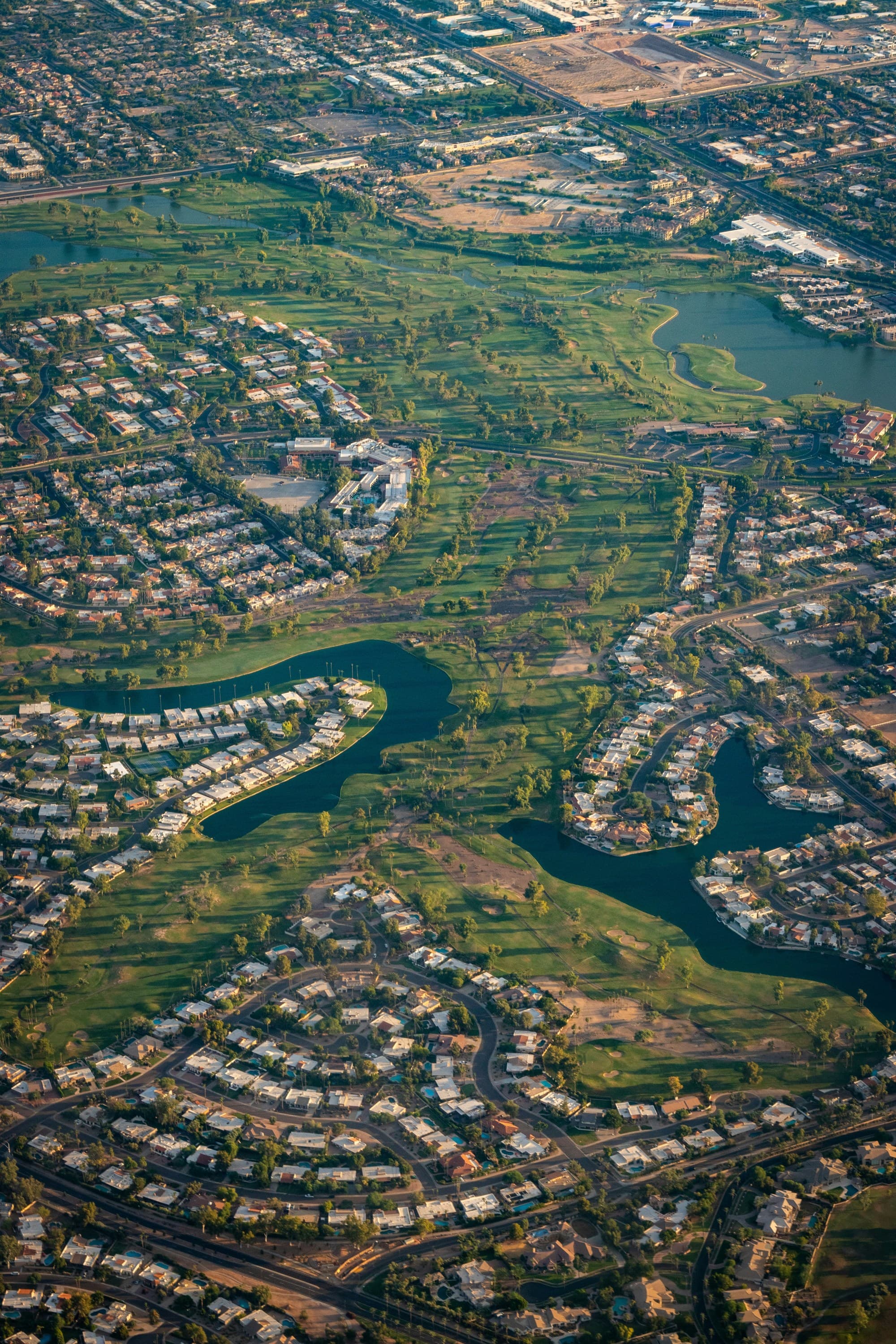 Aerial view of golf courses during the daytime