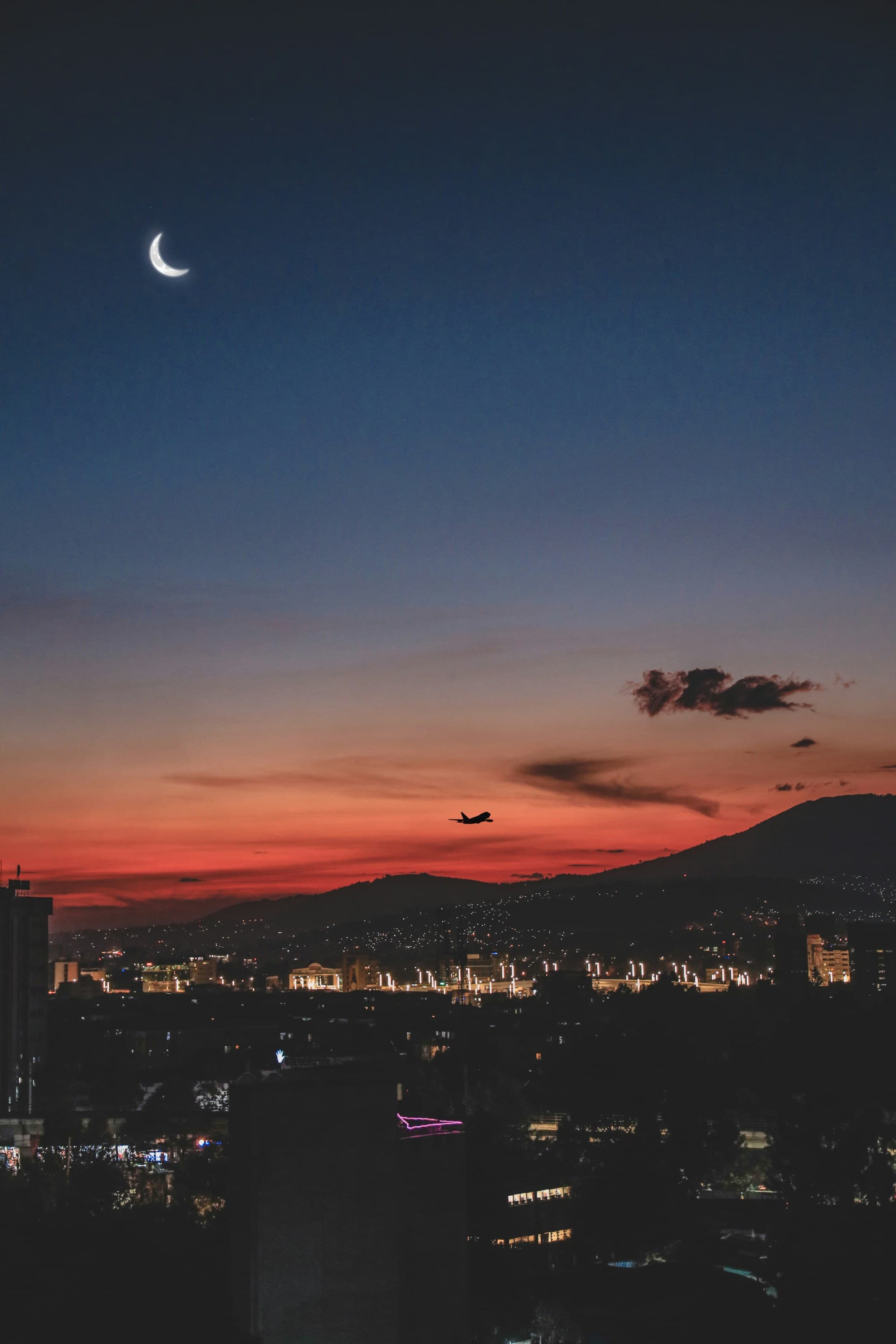 A sunset sky over a city