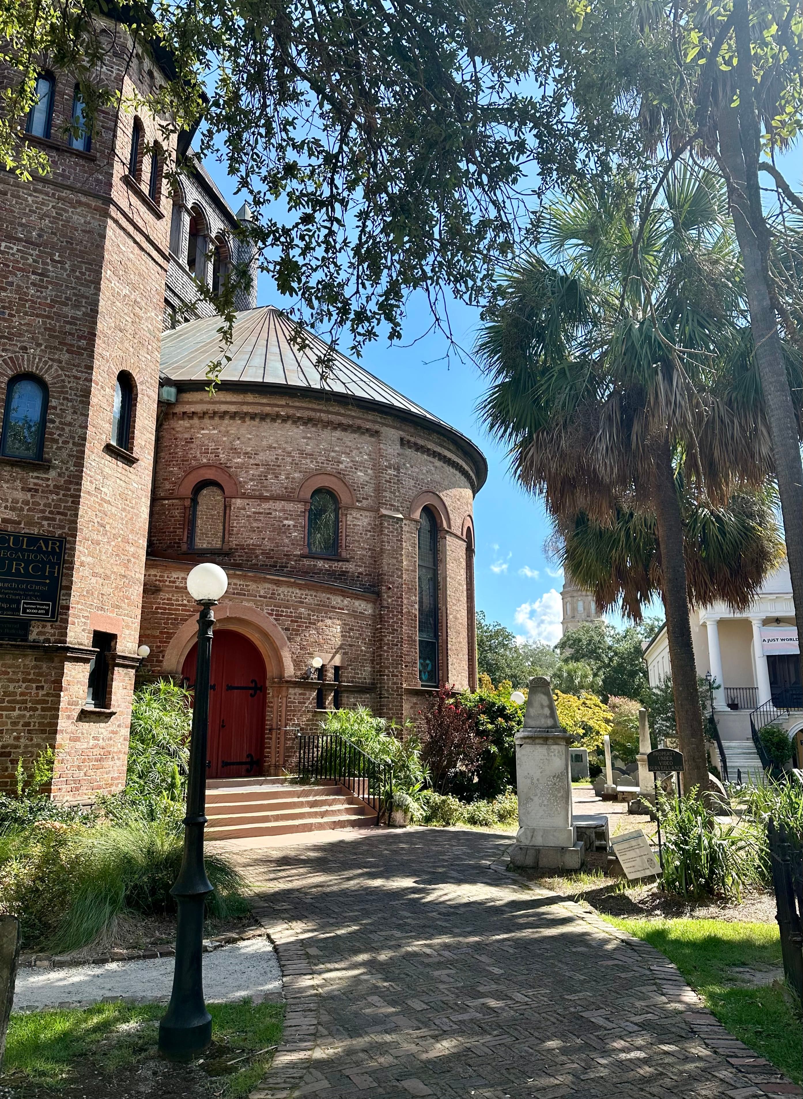 Exterior of a brick church during daytime.